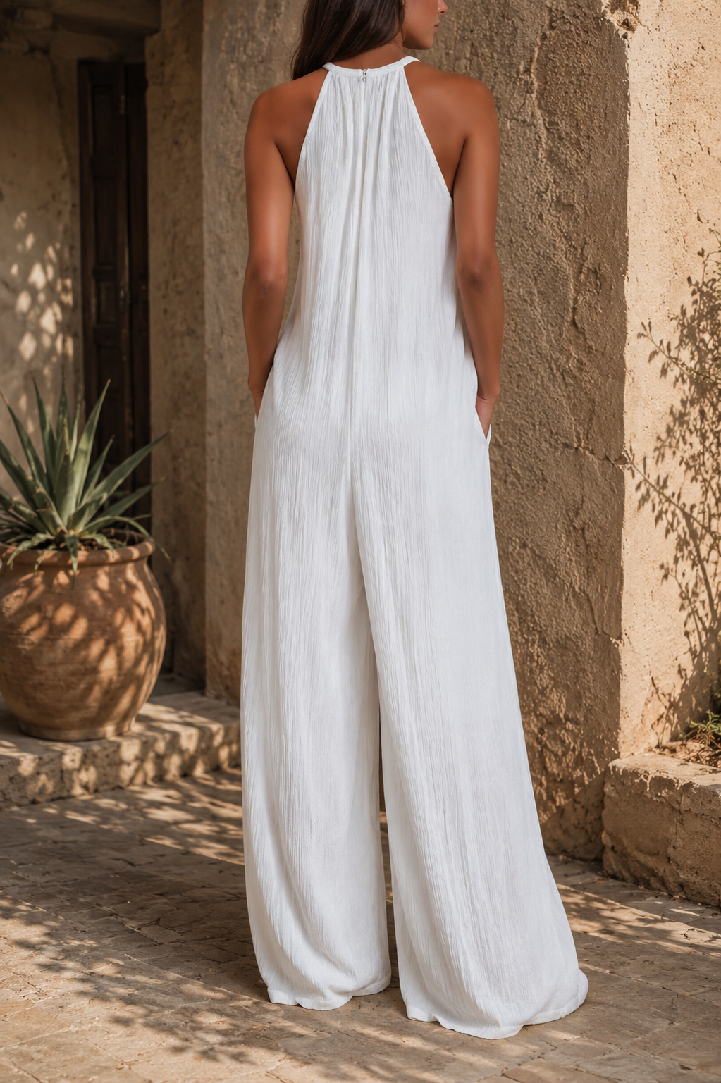 Lucía™| Mono elegante sin mangas con pantalones palazzo